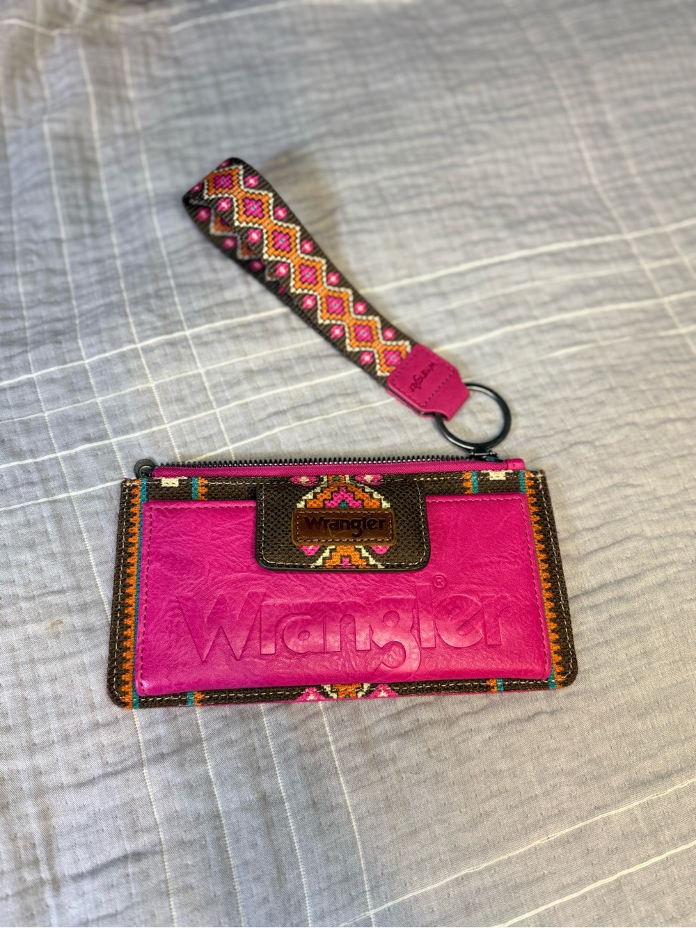 Wrangler Hot Pink Embossed Wristlet with Multicolor Woven Strap
